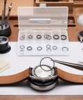 Watch O Ring Gasket Set With 18 Types Of Rubber Sealing Rings For Back Cover Repair Includes 0.5mm And 0.6mm Sizes Durable Silicone Rubber DIY Watch Repair Tool Kit For Handy Gearheads on desk with tweezers and tools