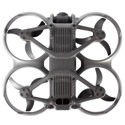 Top view of Avata 2 FPV Drone With Goggles 3 Fly More Bundle, showcasing quadcopter design and propeller arrangement for travel and filming.