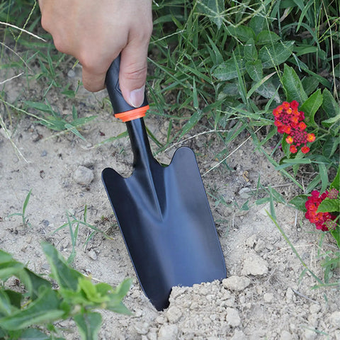 Heavy Duty Garden Trowel With Ergonomic Non Slip Grip Rust Resistant Finish used for digging in garden soil