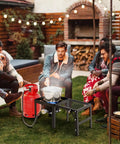 Group cooking on Single Burner Propane Stove With Foldable Side Shelf And 75000 BTU Heat, Portable Gas Stove for outdoor use