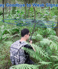Person using High Gain Ham Radio Antenna Gooseneck Pro 3.5 dBi VHF UHF 136 174 400 520 MHz in forest, tactical setup