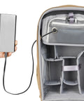 Metro B30L 30L Camera Backpack With Convertible Daypack in Beige, open view showing interior compartments and charging pocket.