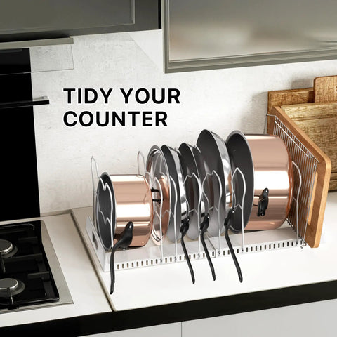 Built Tough Expandable Pan Rack With Ten Adjustable Compartments Heavy Duty Kitchen Pot Organizer displayed with pots and lids on counter.