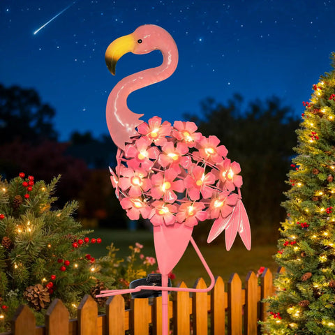 Flamingo Solar Garden Lights 27 LED Warm White Outdoor Stake Light glowing in garden with floral details, night view.