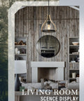 Farmhouse Walnut Wood Pendant Light With Black Glass Shade in rustic living room scene with wooden walls and fireplace.