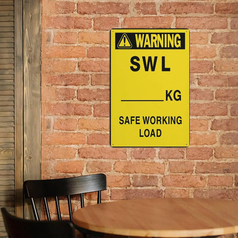 High Visibility Pro Grade 8 By 12 Aluminum Warning Sign For Safe Working Load Compliance on brick wall in workshop