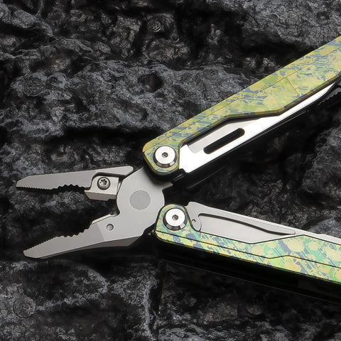 Ultra Lightweight Titanium Alloy Multitool Pliers With Camouflage Finish, 420 Stainless Steel Plier Head on rugged surface