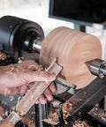 Cryo Treated M2 High Speed Steel Roughing Gouge Three Quarter Inch With Solid Beech Handle in use on a wood lathe for shaping wood.