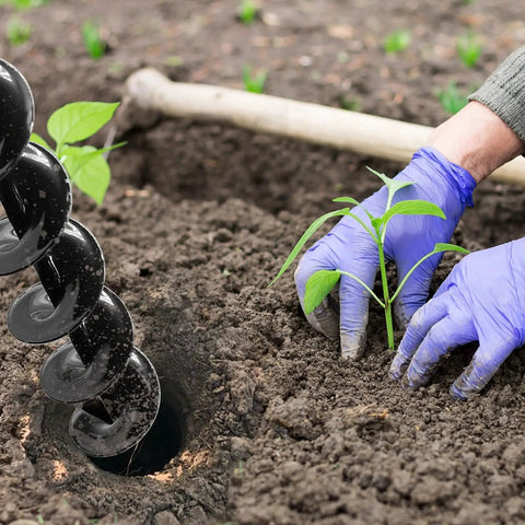 Person planting using 3x24 Inch Garden Auger Drill Bit Set For Planting Bulbs And Bedding Plants Easy Planter Garden Auger Post Hole Digger