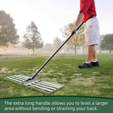 Person using Pro Grade Lawn Leveling Rake With Stainless Steel Pole, Heavy Duty 36x10 Inch Leveller on uneven golf course terrain.