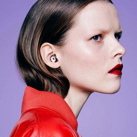 Side view of woman wearing Experience 2 Plus Ear Plugs For Concerts And Festivals With High Fidelity Sound And 17dB Noise Reduction