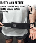 Man demonstrating 16 Inch Wrist Straps For Gym No Thumb Loops Durable Wrist Wraps For Powerlifting Weightlifting Arm Support