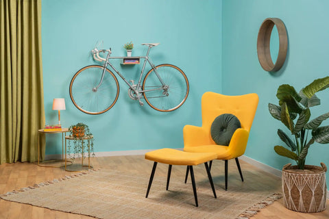 Wall Mounted Bike Rack With Bamboo Shelf For Indoor Storage And Decor, Minimalist Bicycle Hanger For Home And Garage shown in living room