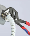 10 Inch Pliers Wrench With 2 Inch Jaw Capacity, 19 Adjustable Positions gripping a metallic pipe, laser marked scale visible.