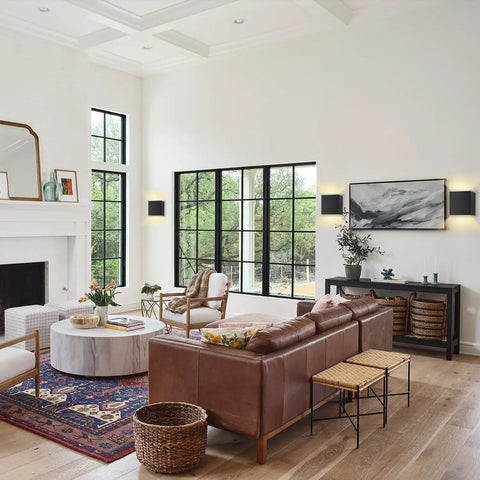 Living room with Cordless Battery Operated Cube Wall Sconces With Remote Dimmable LED Up And Down Lighting, soft glow.