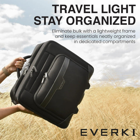 Your Go To Carry On Rolling Laptop Briefcase for 16 Inch Laptops held against sky background.
