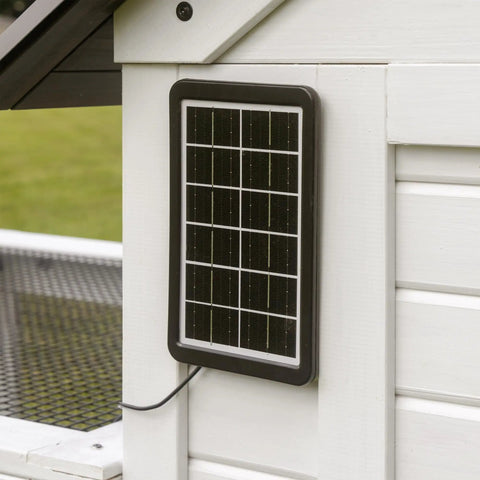 Solar panel on Sweetwater Cedar Chicken Coop For 4 To 6 Chickens With Run Nesting Box Automatic Door Roosting Bars.