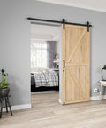 Heavy Duty Sliding Barn Door Hardware Kit 6.6 Ft With Smooth And Quiet Operation installed on wooden door in modern room