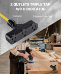 3 outlets triple tap with indicator on a black extension cord, part of the 30 Foot Retractable Extension Cord Reel With Ceiling Or Wall Mount Sixteen Gauge Three Conductor SJTW Power Cord Three Outlets 10 Amp Breaker Metal Plate UL Listed For Garage And Shop used in a workshop.