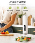 Handheld Vacuum Sealer Keeps Food Hella Fresh With Auto And Manual Modes For Wet And Dry Use, sealing vegetables on counter.
