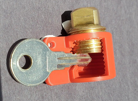 Red Dockside Boat Drain Plug Keychain And Reminder For Garboard Half Inch Drain Plug Half Inch NPT Fitting showing key attachment