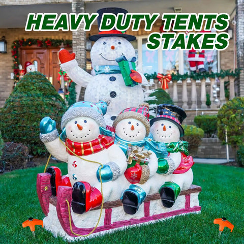 Large inflatable snowmen display secured with orange 20 Pcs 12 Inch Tent Stakes Screw In Heavy Duty Ground Anchors