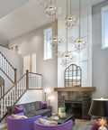 Living room with modern LED globe pendant light with four bubble glass orbs, dimmable 3000K-6000K, remote control included.