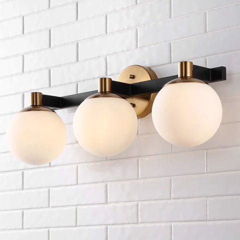 24 Inch Brass Gold And Black Dope Modern Globe LED Vanity Wall Sconce Light With White Frosted Glass Shade For Bathroom Kitchen Hallway Mid Century Art Deco Style Lighting Fixture, shown on a white tiled wall.