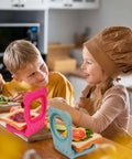 LEPCY Uncrustables sandwich cutter sealer, two crustless square cutters in rose red and teal used for PB&J sandwiches.