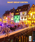 Outdoor LED Flood Lights Lit RGB Color Changing Smart Landscape Lights With 16 Million Colors Dimmable White Light Scene And Music Modes IP66 Waterproof Uplighting App And Voice Control For Patio Garden Yard Stage 6 Pack illuminating snowy houses at night with smart group control