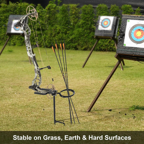 Beefy Bow Stake With 360 Degree Adjustable Rotating Fork And Arrow Ring for stable archery setup on grass with targets in view.