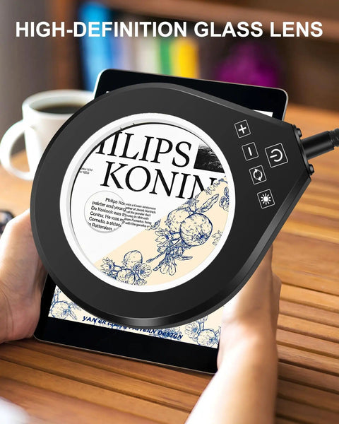 Person using Gooseneck 2 In 1 Magnifying Glass With Light And Stand 10x And 5x Real Glass Lenses to read a tablet