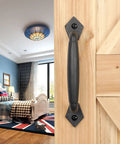 Rustic 8 Inch Heavy Duty Barn Door Pull Handle For DIY Sliding Barn Door Gate Shed Garage Matte Black Round Solid Metal Construction With Craftsman Grade Mounting Hardware Included installed on wooden door