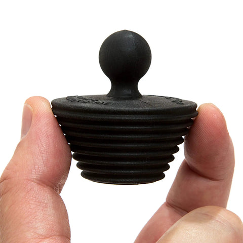 Universal Drain Stopper For Bathtub And Sink Your Go To Two Pack Black Plug Fits Most Drains Easy To Use Reusable Bath Tub Shower Plug For Baths And Sinks Durable Silicone Construction For Tight Seal And Easy Removal held with fingers