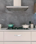 White kitchen with two pack white leather drawer pulls for industrial style furniture upgrade installed on cabinets and drawers.