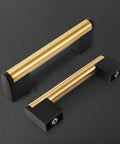 Gold And Black Cabinet Handles Pack Of 10 Slick Brushed Brass Look Drawer Pulls For Kitchen Bath And Bedroom Furniture Three And Three Quarters Inch Hole Centers 96 mm Durable Zinc Alloy With Stainless Steel Tube Core shown at an angle on a black background. Product highlighted with focus on design and finish.