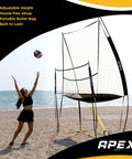 Indoor And Outdoor Volleyball Training Net System Built To Last Sturdy Adjustable And Portable For Realistic Practice Boost Your Accuracy Timing And Technique And Skills With Easy Assembly And Quick Storage used on a beach.