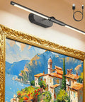 Twenty Four Inch Wireless Picture Light For Wall Rechargeable Art Lamp With Remote 8000 Mah Battery Pack illuminating a framed painting.