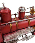 Close-up of Metal Classic Locomotive Model Train Christmas Decor Vintage Tabletop Centerpiece For Holiday Dining Red Carriage