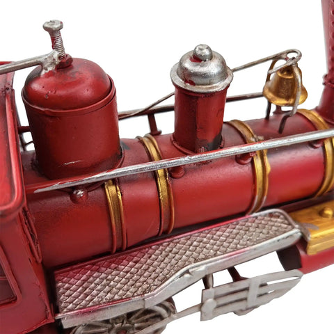 Close-up of Metal Classic Locomotive Model Train Christmas Decor Vintage Tabletop Centerpiece For Holiday Dining Red Carriage
