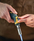 Person using Pro Grade Precision Flame Hand Torch With Adjustable Heat For MAP Pro Propane Fuel for jewelry making
