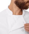 Close-up of Le Mans Chef Coat for Men White Large with Easy Movement Fit, showing flexible chest cut and durable polyester cotton blend.