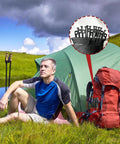 Man camping with 24 Pack Tent Stakes 12 Inch Heavy Duty Forged Steel Stakes That Are Tough As Nails and storage pouch.