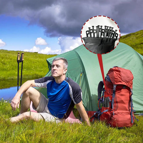 Man camping with 24 Pack Tent Stakes 12 Inch Heavy Duty Forged Steel Stakes That Are Tough As Nails and storage pouch.