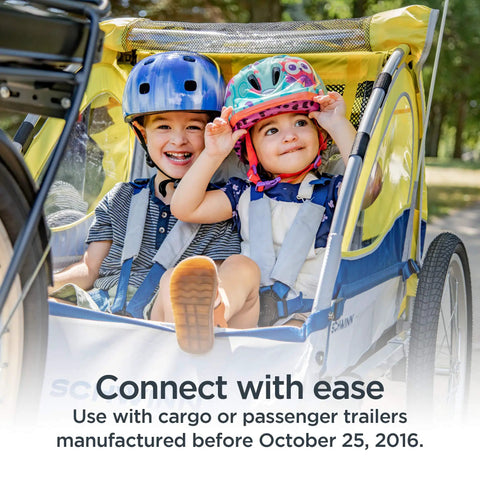 Two children seated in a blue and yellow bike trailer, wearing helmets, attached using Universal Flat Bike Trailer Coupler For A Wide Range Of Bicycle Sizes And Models Easy Hookup For Cargo And Child Trailers Fits Most Standard Hitches Durable Black. 