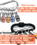 Comparison of old silver and new black 1/4 inch hex shank bit holder keychains, showing safety enhancements and color.