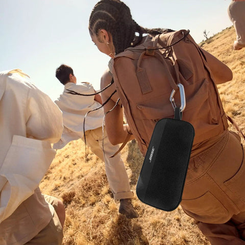 Person hiking with SoundLink Flex Bluetooth Speaker Second Gen Portable Outdoor Party Buddy With Hi Fi Audio Waterproof And Dustproof USB C