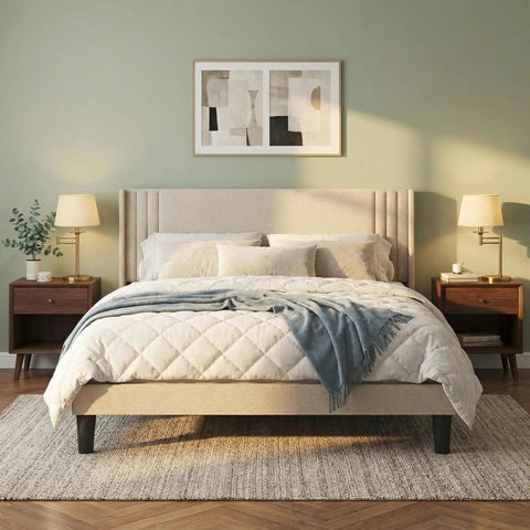 Prime Queen Bed Frame With Plush Wingback Headboard And Heavy Duty Steel Base For Ultimate Lounge Comfort And Durable Support To Kick Back And Rock Your Bedroom Setup, styled with neutral bedding and nightstands.