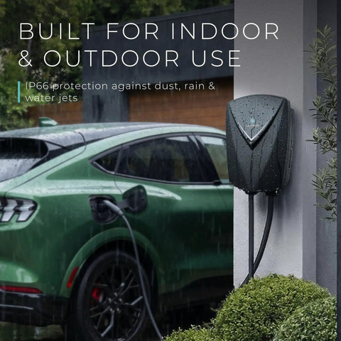 J1772 Level Two EV Charger 40 Amp 240 Volt With 23 Foot Cord And Nema 14 50 Plug mounted on wall charging a vehicle in rain.