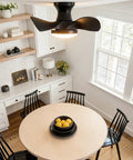 ABS Ceiling Fan with 3 Color Temperature LED Light and Remote Control mounted above a round dining table in a bright room.